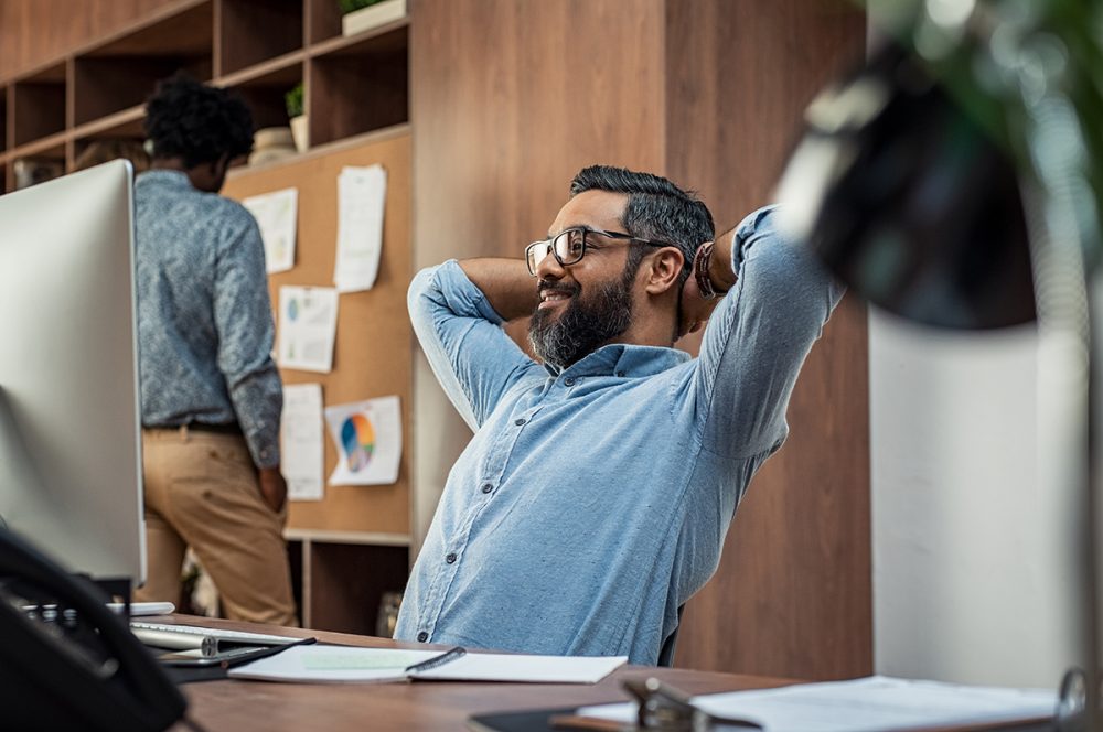 Image of a man happy with the big decisions surrounding a new accounting app for his practice and clients 